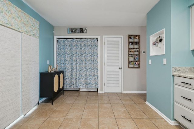 bathroom with tile patterned flooring