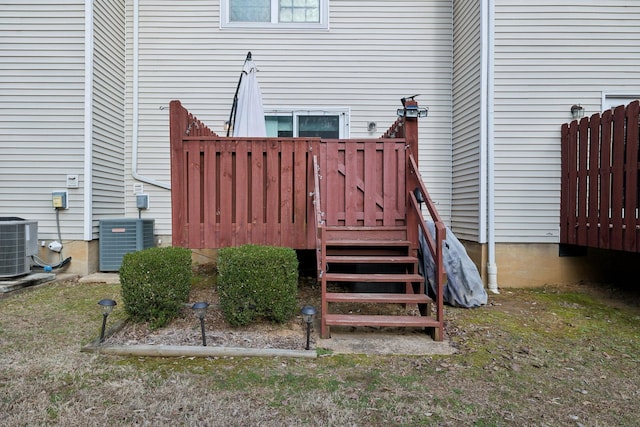 exterior space with cooling unit and a deck