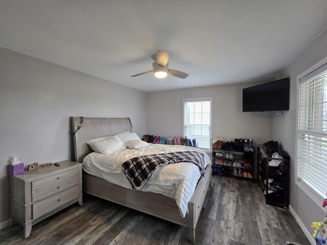 bedroom featuring dark wood-type flooring and ceiling fan