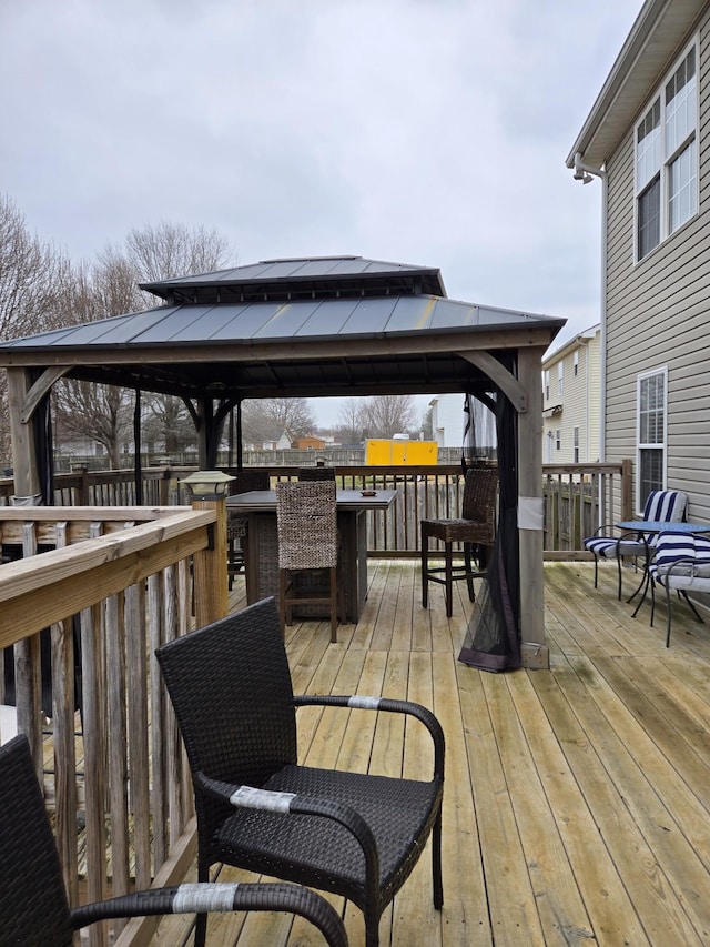 wooden deck with a gazebo