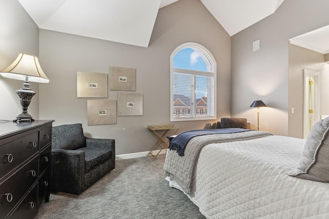 carpeted bedroom featuring lofted ceiling