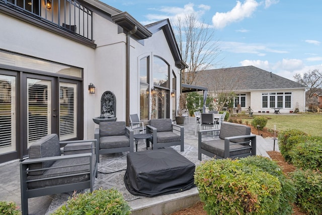 view of patio featuring area for grilling and outdoor lounge area