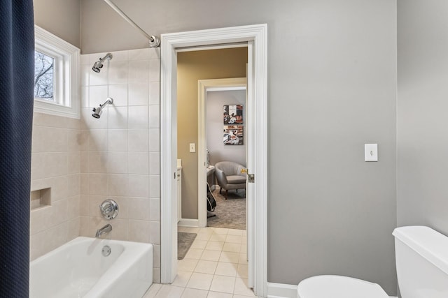 bathroom with tile patterned floors, toilet, and shower / bath combo