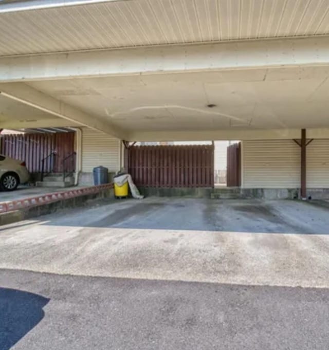 302 Plymouth Rock Ct, Madison, TN 37115 - garage with a carport