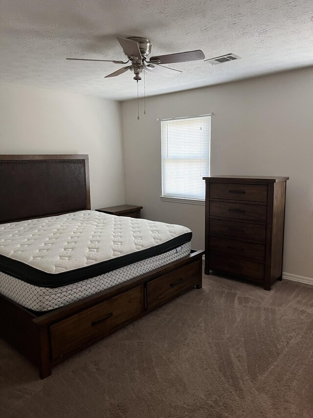 302 Plymouth Rock Ct, Madison, TN 37115 - carpeted bedroom with ceiling fan and a textured ceiling