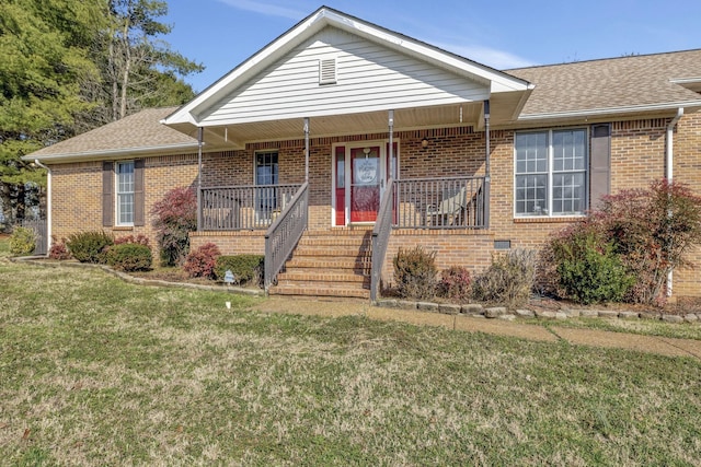 view of front of home featuring covered porch and a front yard