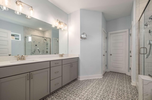 bathroom with vanity and an enclosed shower