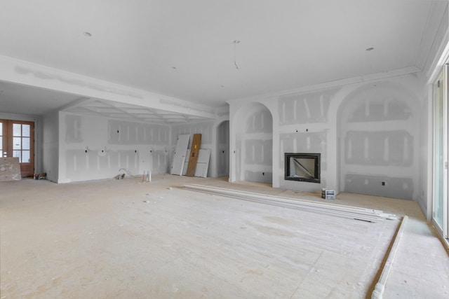 unfurnished living room with french doors