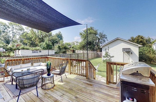 deck with an outdoor hangout area and a yard