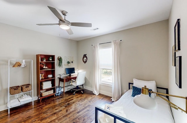 bedroom featuring dark hardwood / wood-style floors and ceiling fan