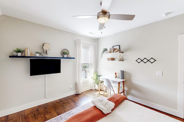 interior space with wood-type flooring and ceiling fan