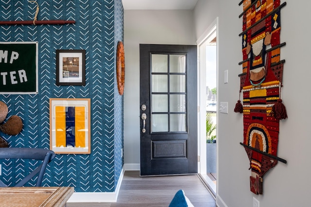 foyer with wood-type flooring