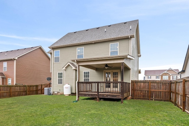 back of property featuring a yard, cooling unit, a deck, and ceiling fan