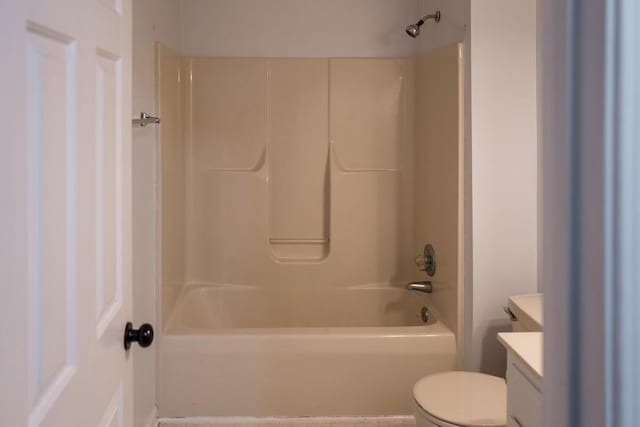 full bathroom featuring shower / bathtub combination, vanity, and toilet