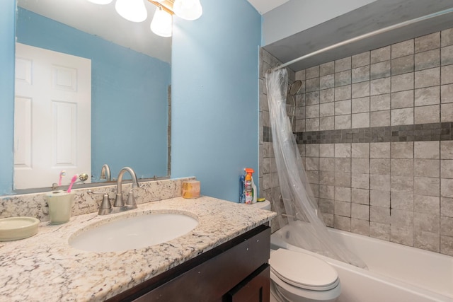 full bathroom with shower / bathtub combination with curtain, vanity, and toilet