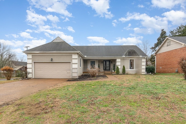 ranch-style house with a garage, a front yard, and covered porch