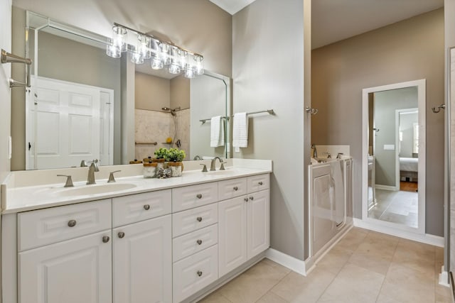 bathroom with vanity and tile patterned flooring