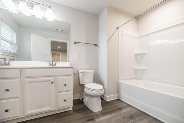 1335 Crescent Ridge Dr, Gallatin, TN 37066 - full bathroom with wood-type flooring, toilet, vanity, and shower / bathing tub combination