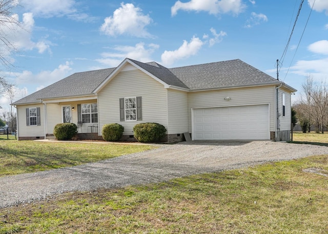 single story home with a garage and a front lawn