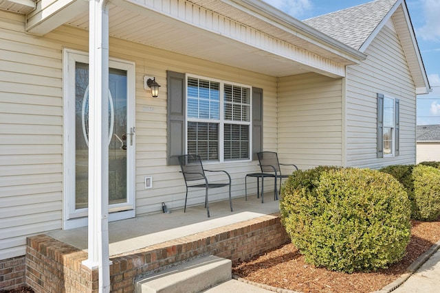 entrance to property with covered porch