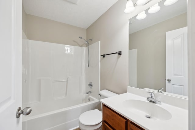 full bathroom featuring shower / tub combination, vanity, and toilet