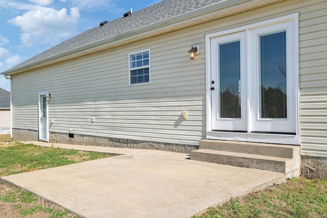 doorway to property with a patio area