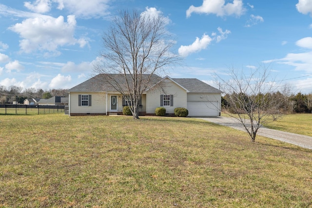 ranch-style home with a garage and a front lawn