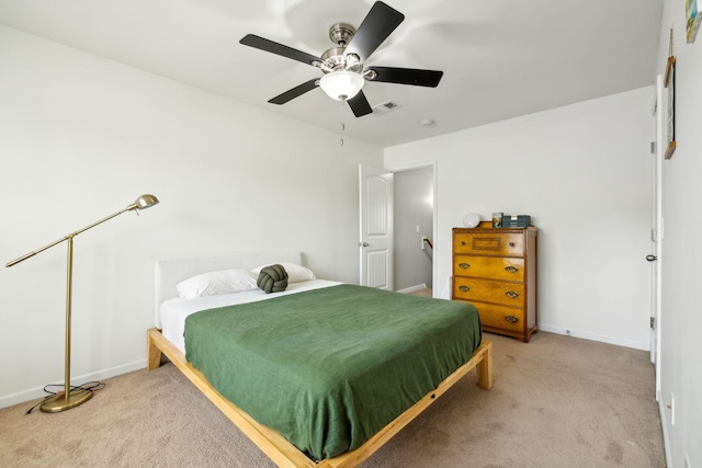 bedroom featuring ceiling fan and carpet flooring