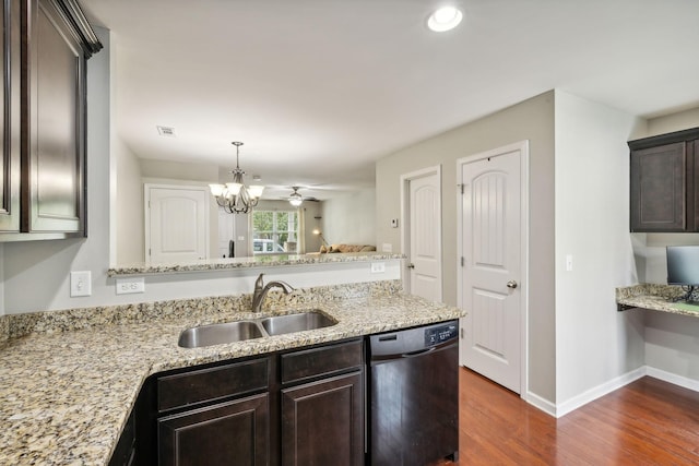 kitchen featuring dark wood-type flooring, dark brown cabinetry, sink, light stone counters, and dishwasher