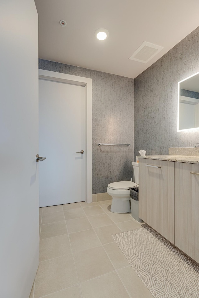 515 Church St Unit 3208, Nashville, TN 37219 - bathroom with tile patterned floors, toilet, and vanity