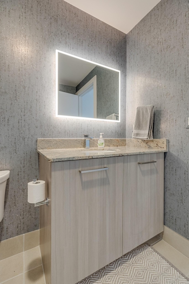 515 Church St Unit 3208, Nashville, TN 37219 - bathroom with vanity, tile patterned floors, and toilet