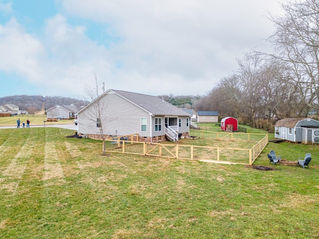 view of yard with a storage unit