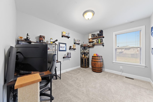 home office featuring light carpet