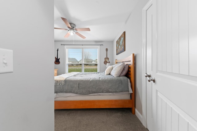 carpeted bedroom featuring ceiling fan