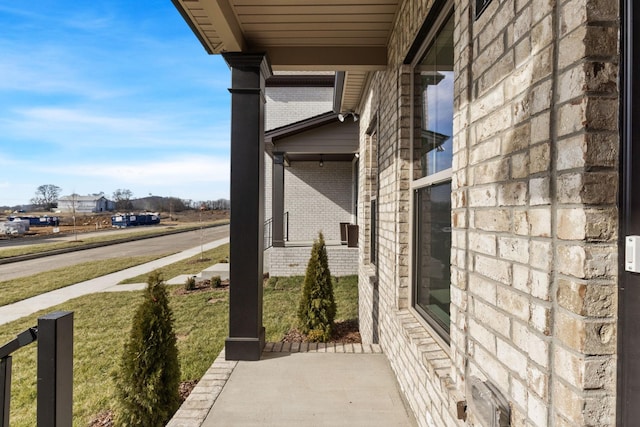 view of property exterior with a porch