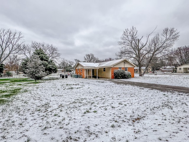 view of front of house with brick siding