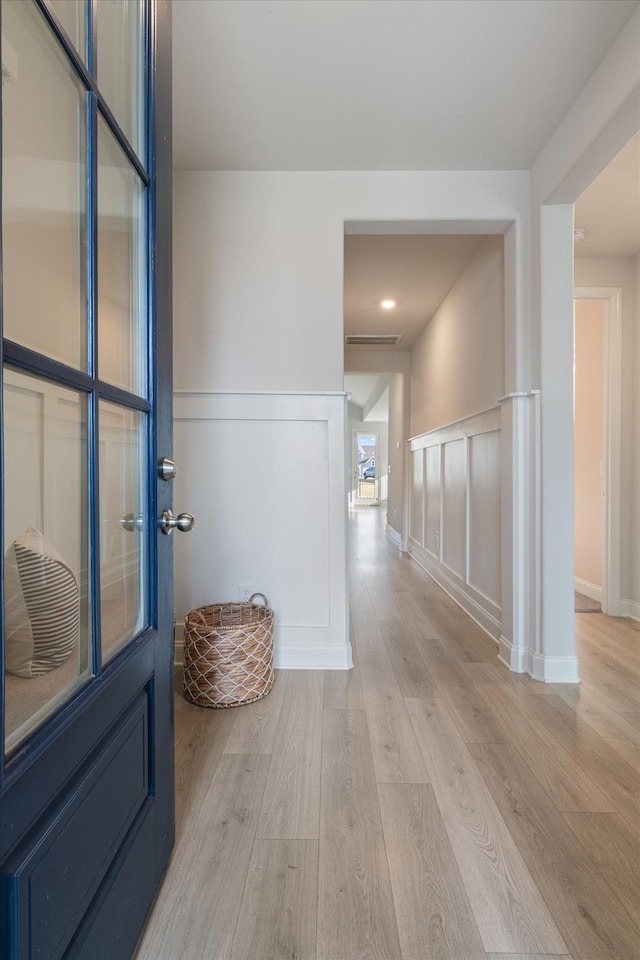 interior space with light hardwood / wood-style flooring