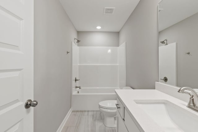 full bathroom with vanity, bathtub / shower combination, and toilet