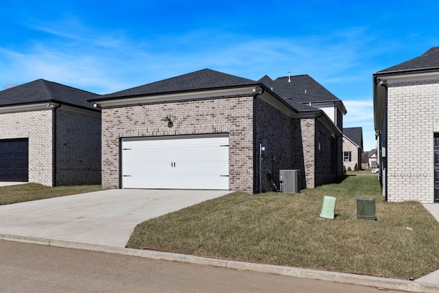 view of property exterior featuring central AC unit, a garage, and a lawn