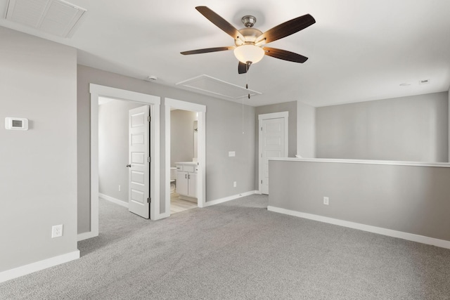 spare room with light colored carpet