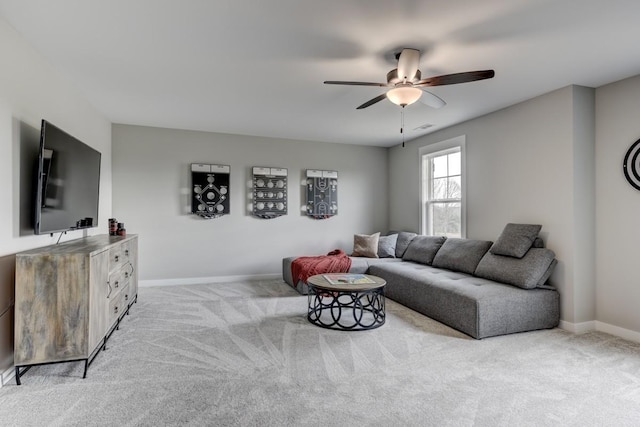 living room with ceiling fan and light carpet