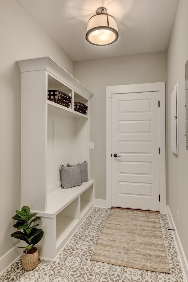 mudroom featuring light tile patterned flooring