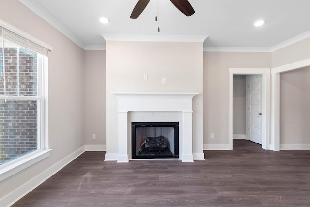 unfurnished living room featuring ornamental molding, ceiling fan, and dark hardwood / wood-style flooring