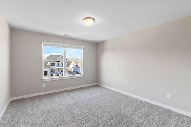 view of carpeted spare room