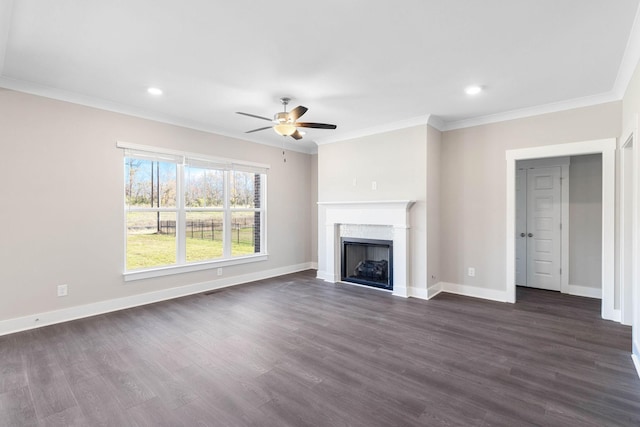 unfurnished living room with ornamental molding, dark wood-type flooring, and ceiling fan