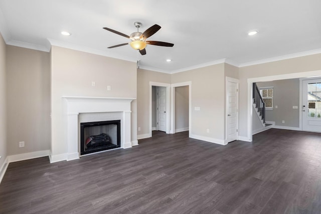 unfurnished living room featuring crown molding, dark hardwood / wood-style floors, and ceiling fan