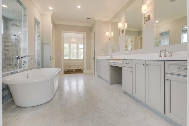 bathroom featuring ornamental molding, separate shower and tub, and vanity