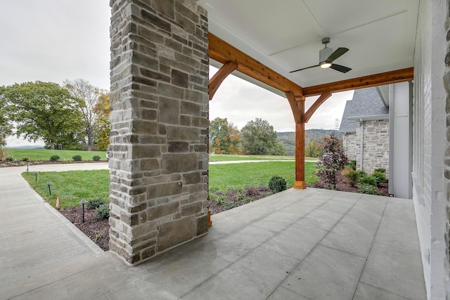 view of patio / terrace featuring ceiling fan