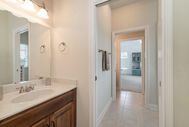 bathroom with vanity and tile patterned flooring