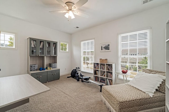 office area featuring ceiling fan and carpet flooring